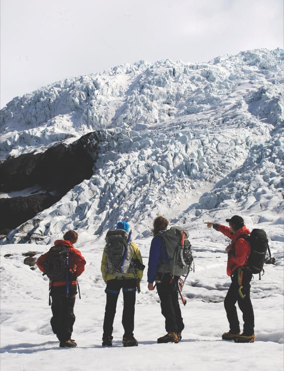 four-people-on-glacier-hike