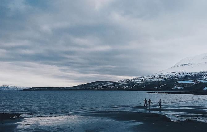 Swimming in the cold sea at the Hauganes hot tops