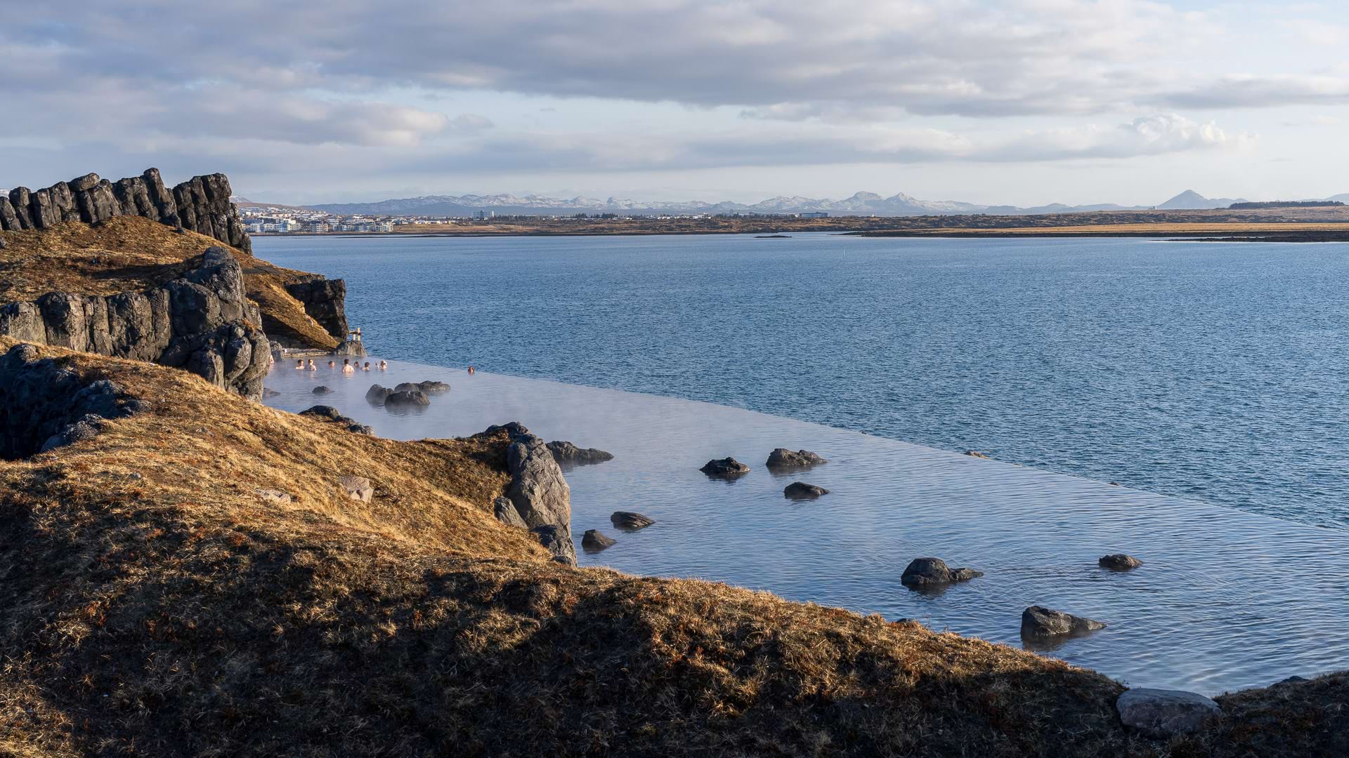 Sky Lagoon in Iceland with a view of the ocean