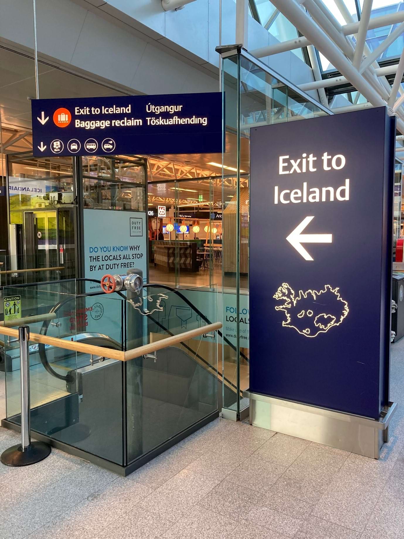 Exit to Iceland sign at KEF airport