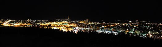 Aerial night view of the city with city lights