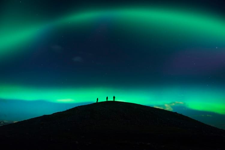 Watching the aurora borealis from the top of the mountain