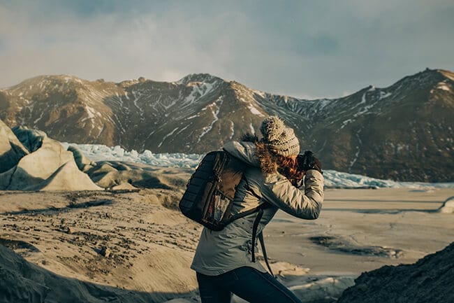 Woman-taking-pictures-in-Iceland.jpg